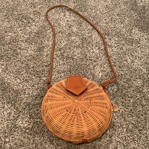 J McLaughlin circle wicker bag